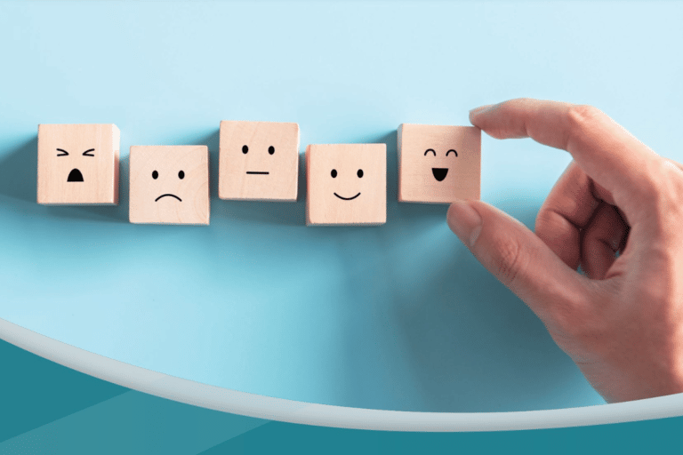 wood blocks with faces painted showing various emotions