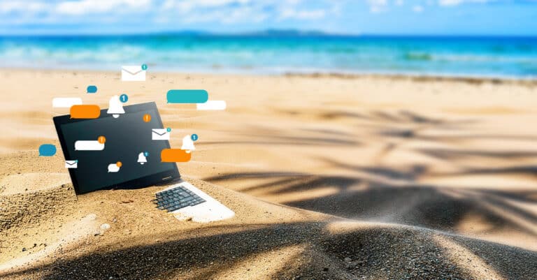 Laptop buried in sand on a sunny beach with floating notification icons above it